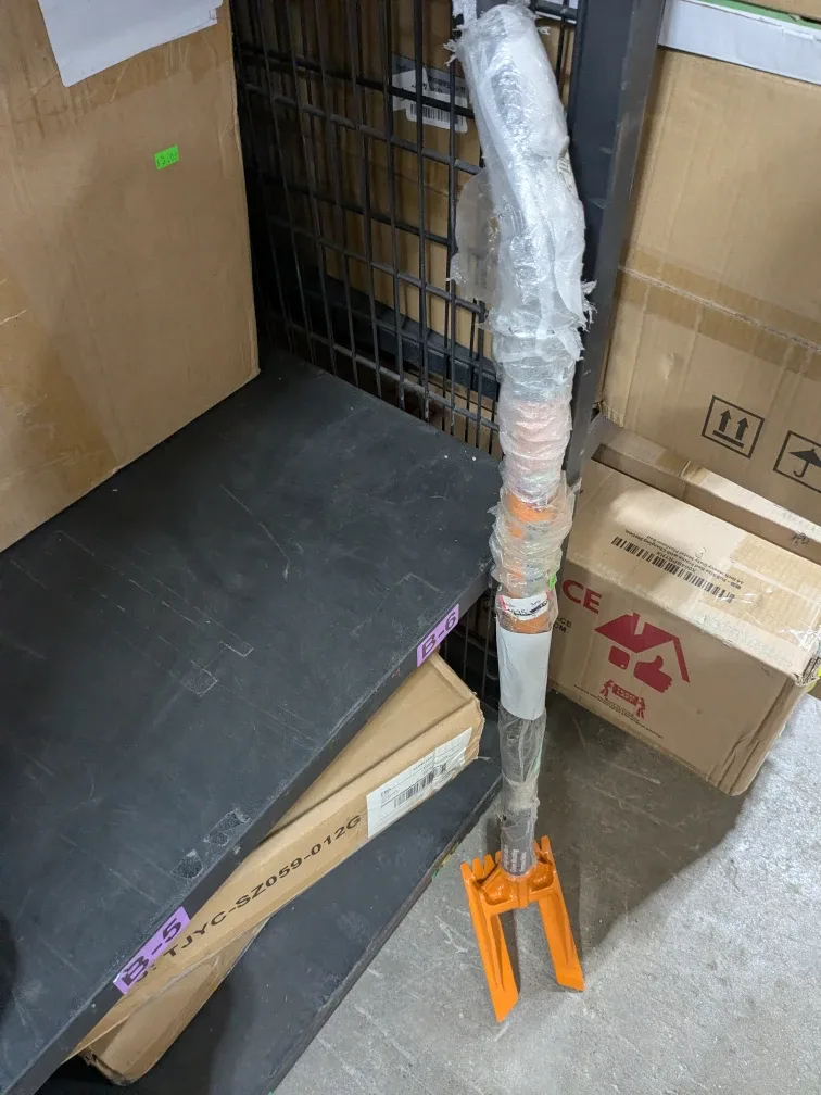 Orange Post Hole Digger