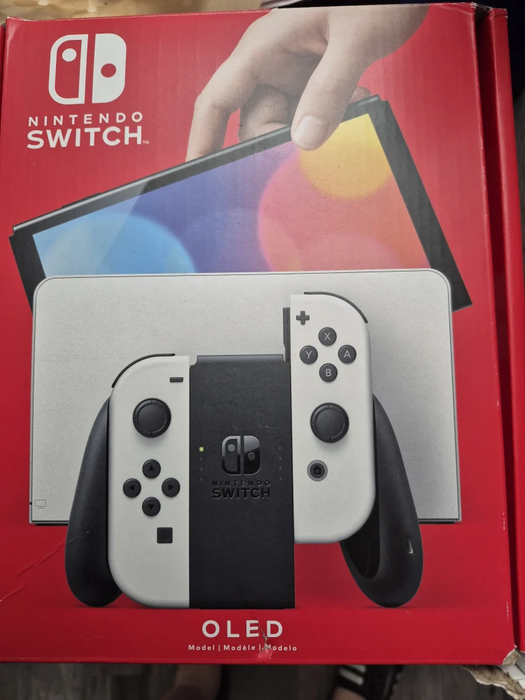 Nintendo Switch OLED + Games (used)