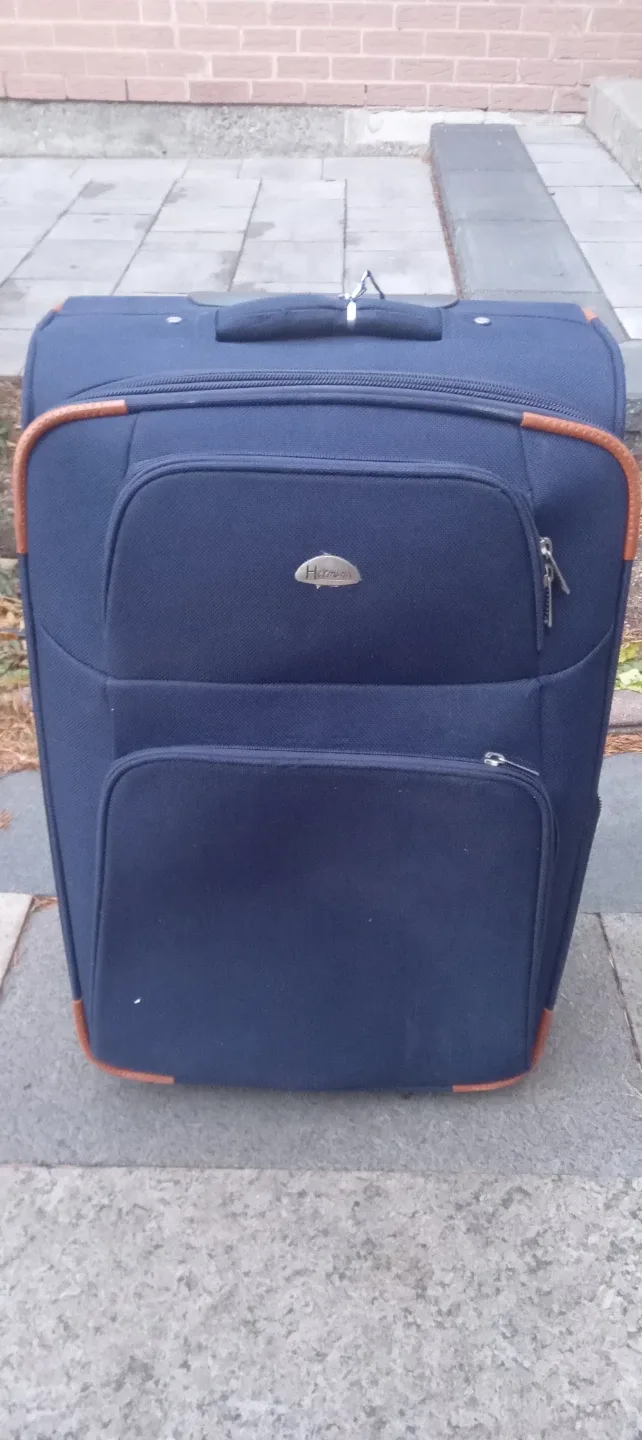 Heys Navy Blue Rolling Suitcase