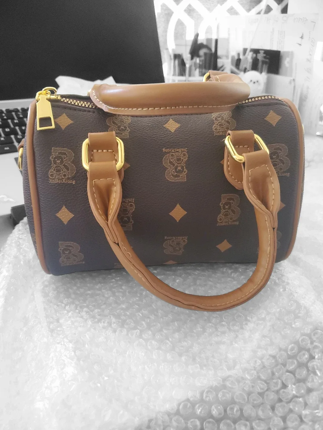 Brown Barrel Handbag with Bear Pattern