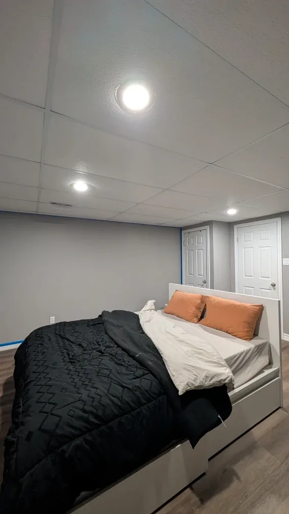 Bedroom setup with bed frame, mattress