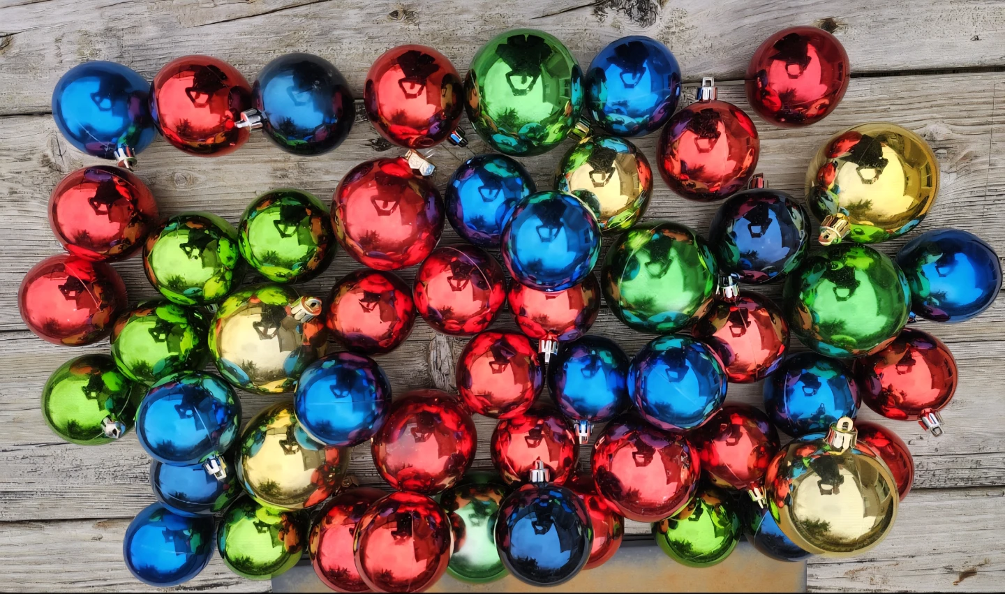 Shiny multi colour holiday ornaments.