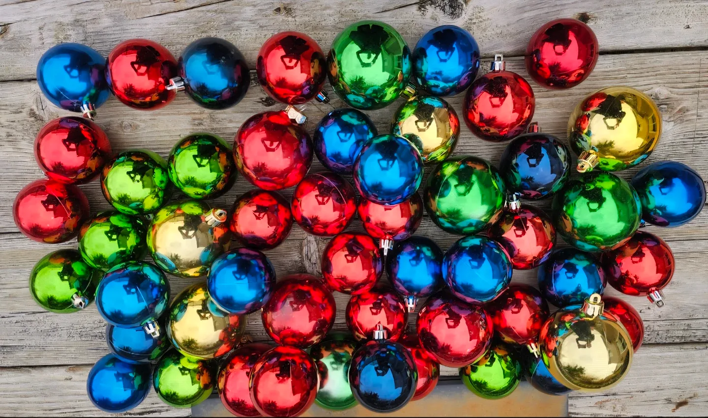 Shiny multi colour holiday ornaments. thumbnail