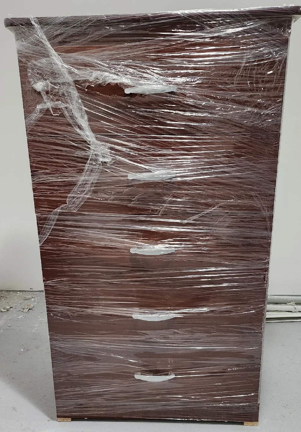 2 Brown Wooden 5-Drawer Dressers, each $70.