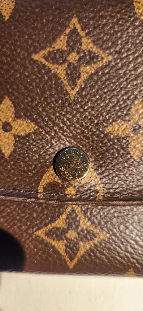 Louis Vuitton Monogram Empreinte Leather Wallet image indicator(6)