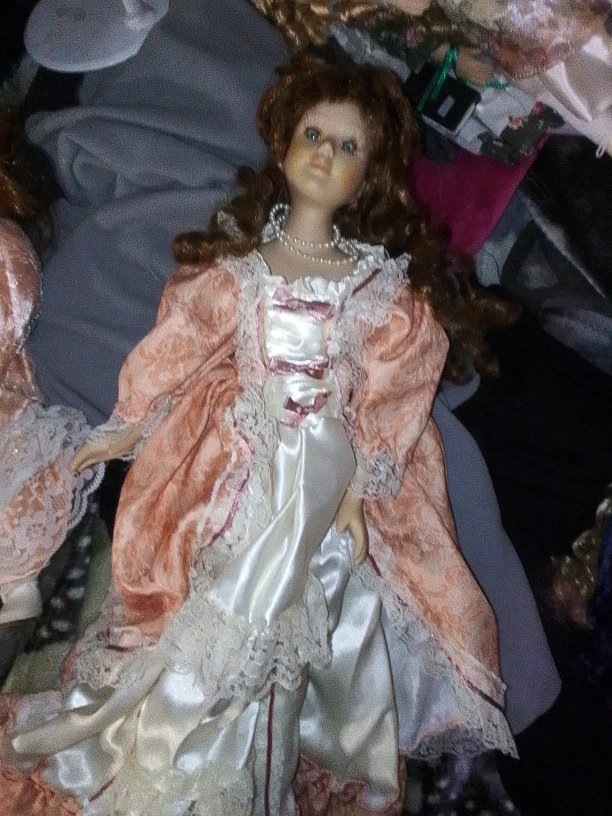 Porcelain Doll in Peach and White Dress