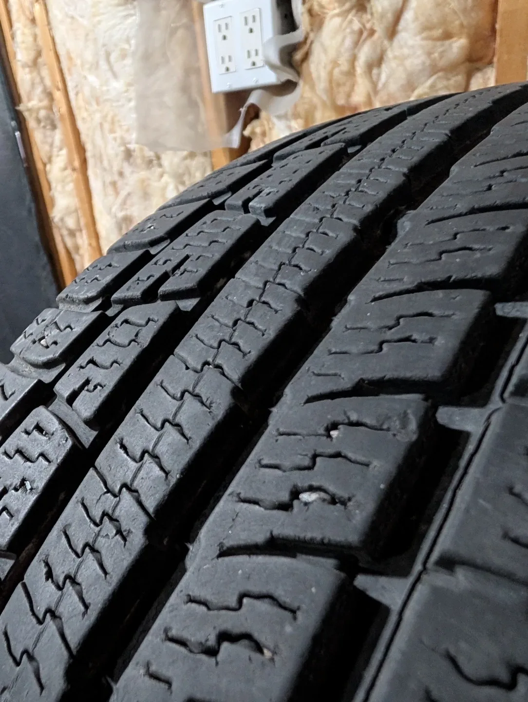 (4)-215/65R17 All Weather Tires On Rims Off 2006 Chrysler 300 image indicator(4)