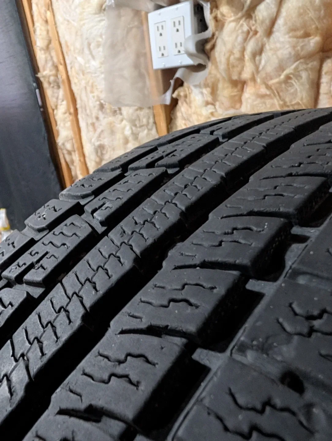 (4)-215/65R17 All Weather Tires On Rims Off 2006 Chrysler 300 image indicator(6)