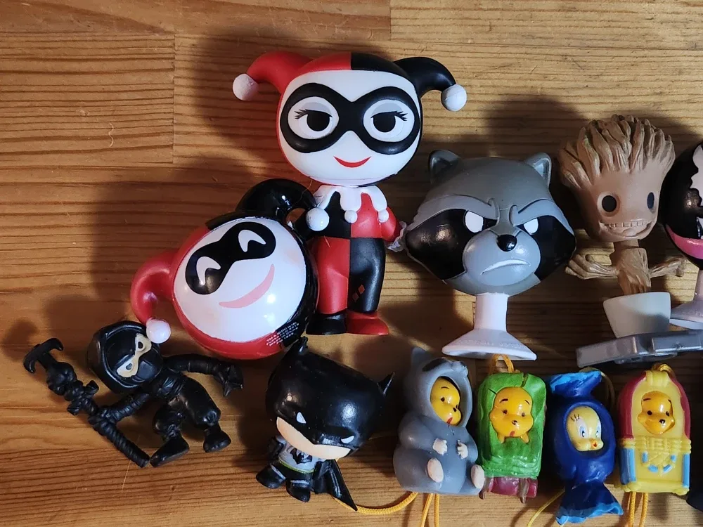 Assorted Collectible Figurines - DC, Marvel, Looney Tunes image indicator(3)