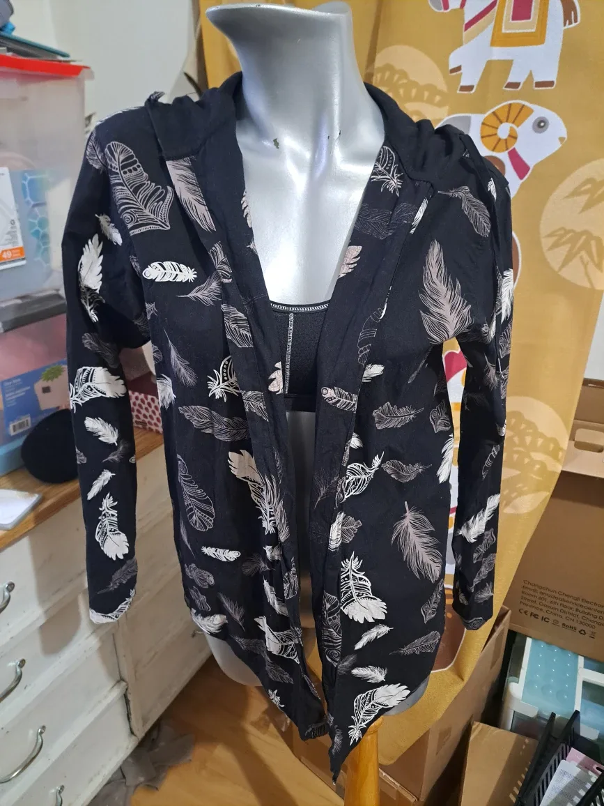 Feather patterned sweater