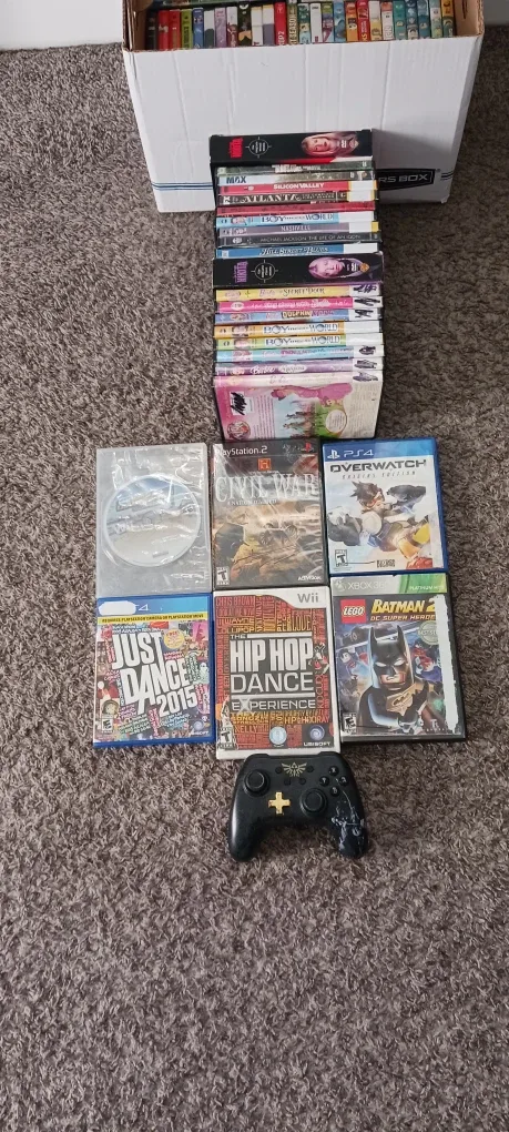 For sale a bunch of movies and games