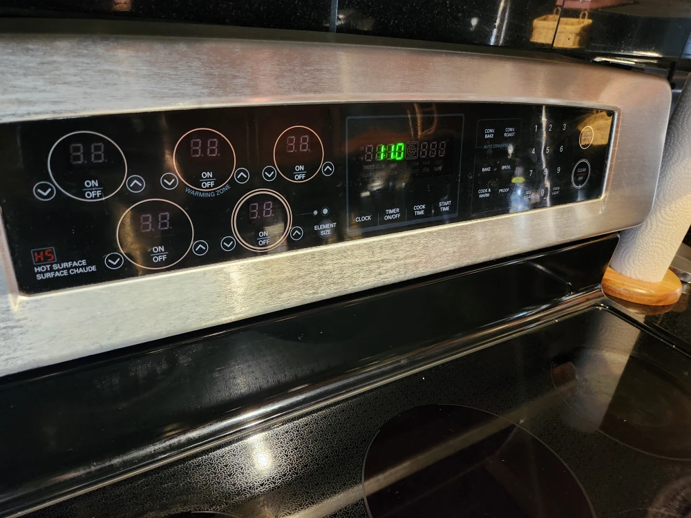GE Stainless Steel Electric Range - photo 2