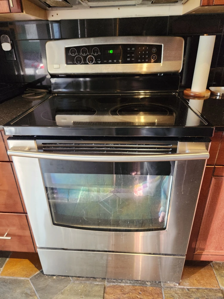 GE Stainless Steel Electric Range - photo 3