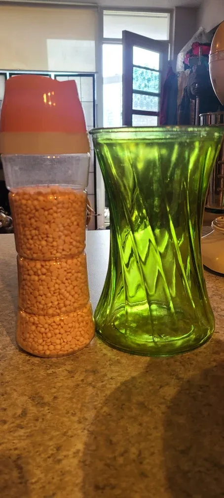 Laundry booster and green vase