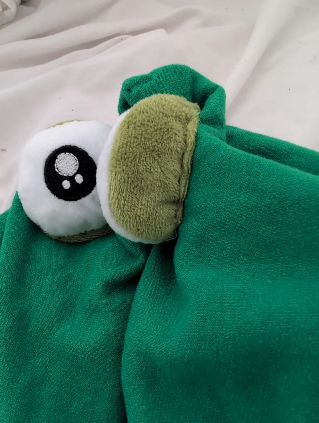 Green Hoodie with big fabric eyes image indicator(2)