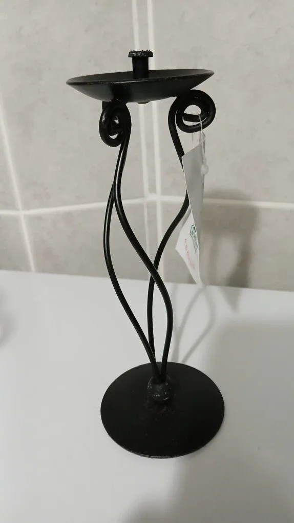 Wrought iron candle holders for $2.00 each image indicator(2)