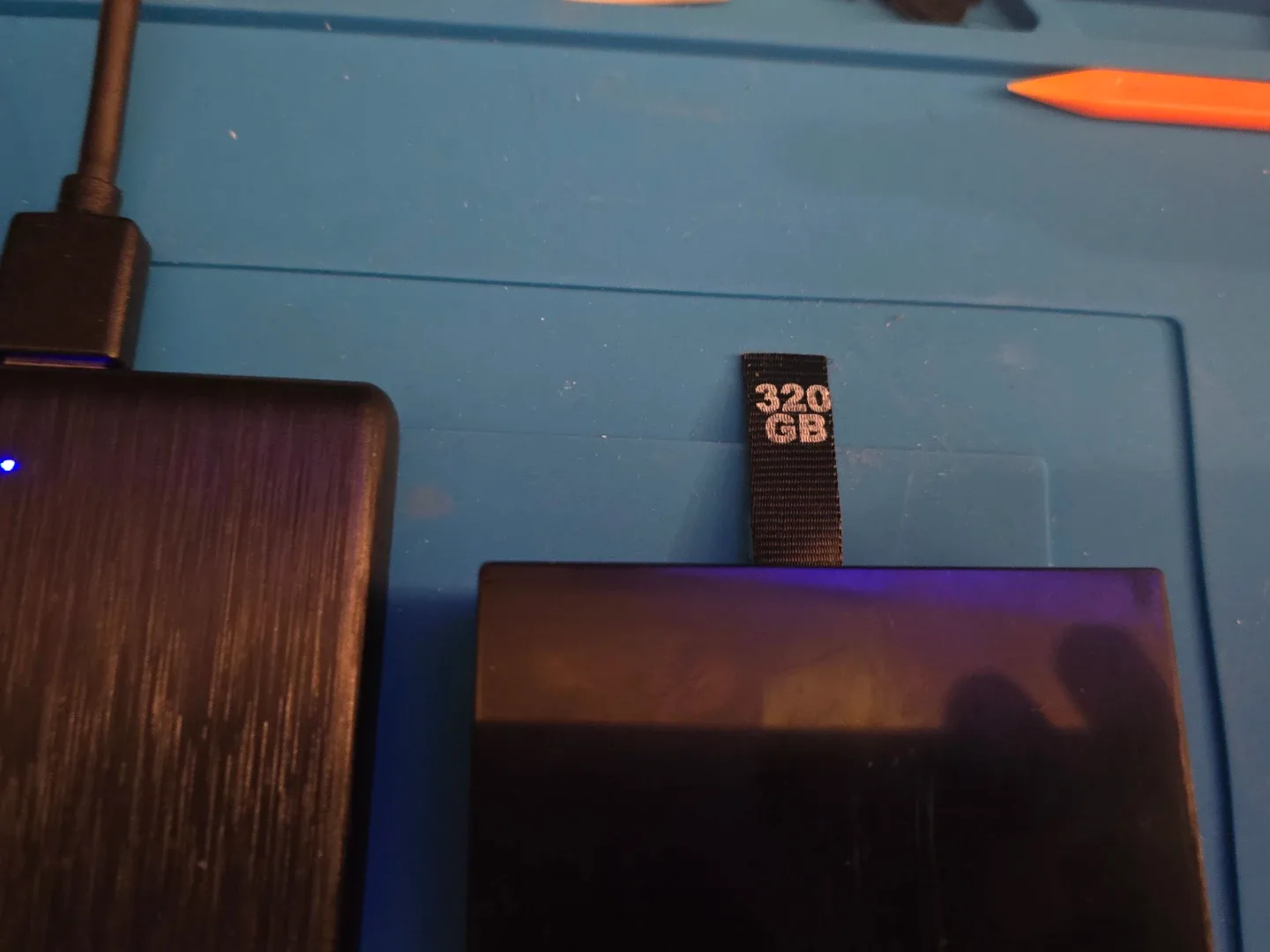 Xbox 360 slim edition 320gb internal and 1 tb ext drive image indicator(3)