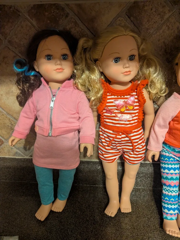 Three Dolls with Accessories