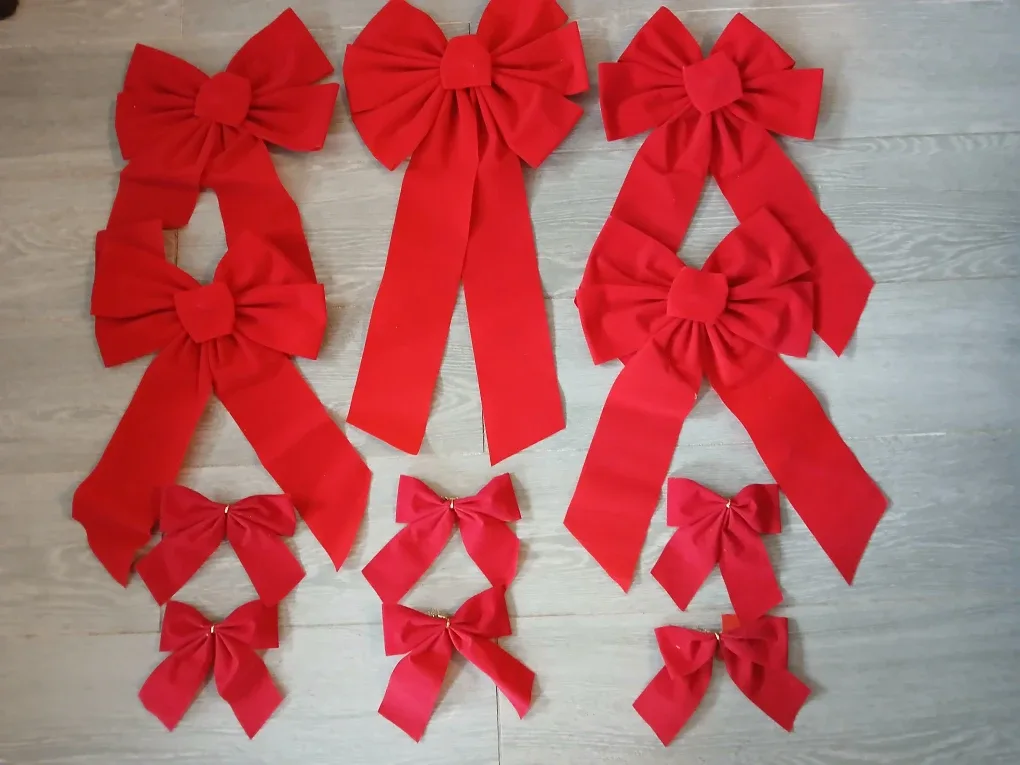 Set of 11 Red Christmas Bows available. Firm price.