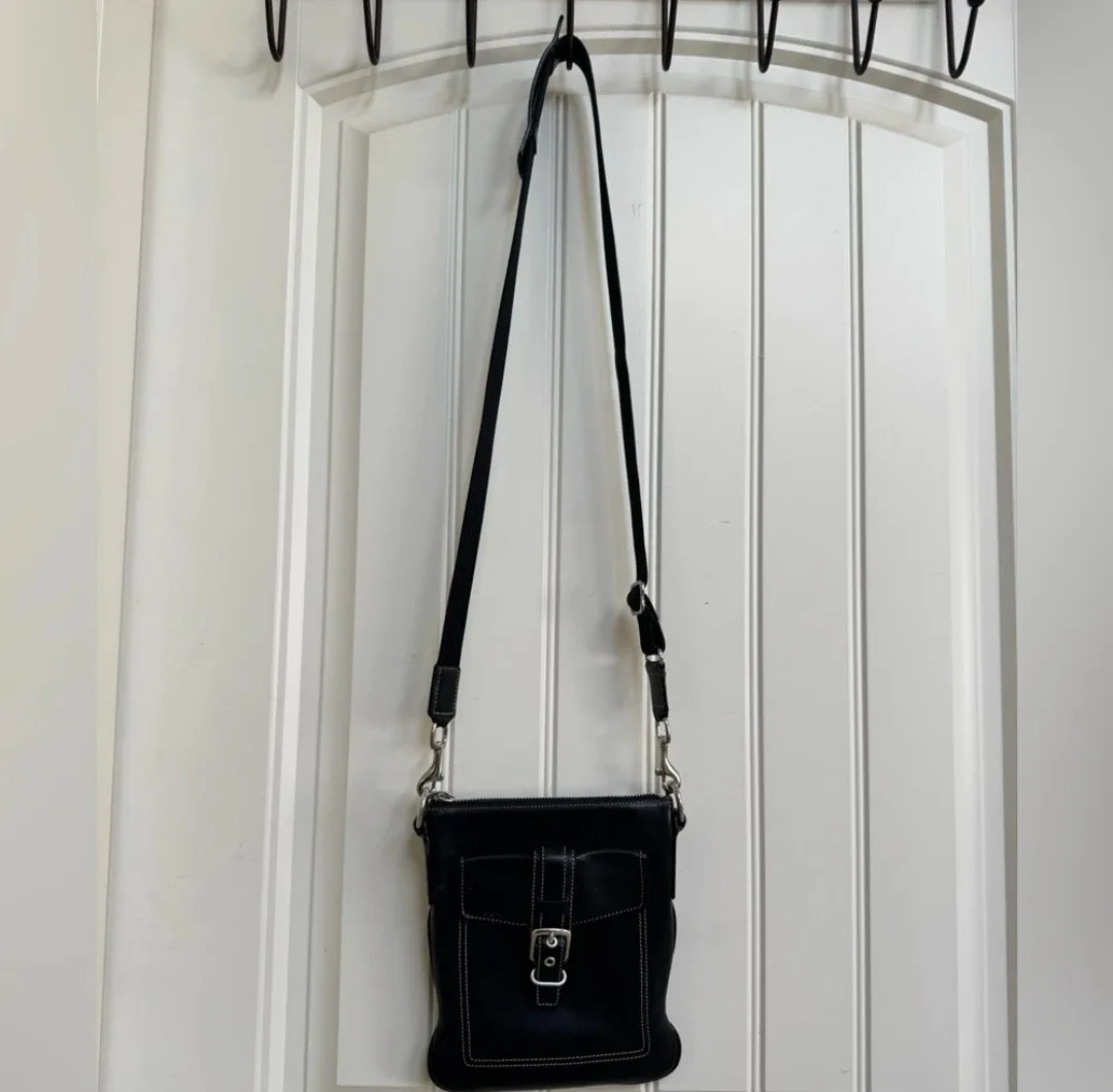 Black  leather  coach crossbody image indicator(2)