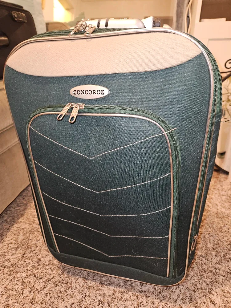 Concorde Green Rolling Suitcase