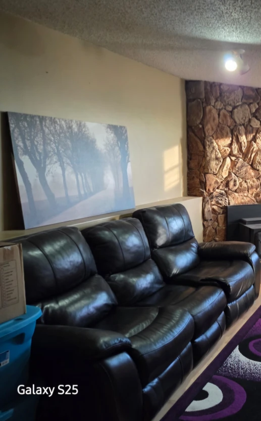 Black Leather Reclining Sofa and Recliner Set