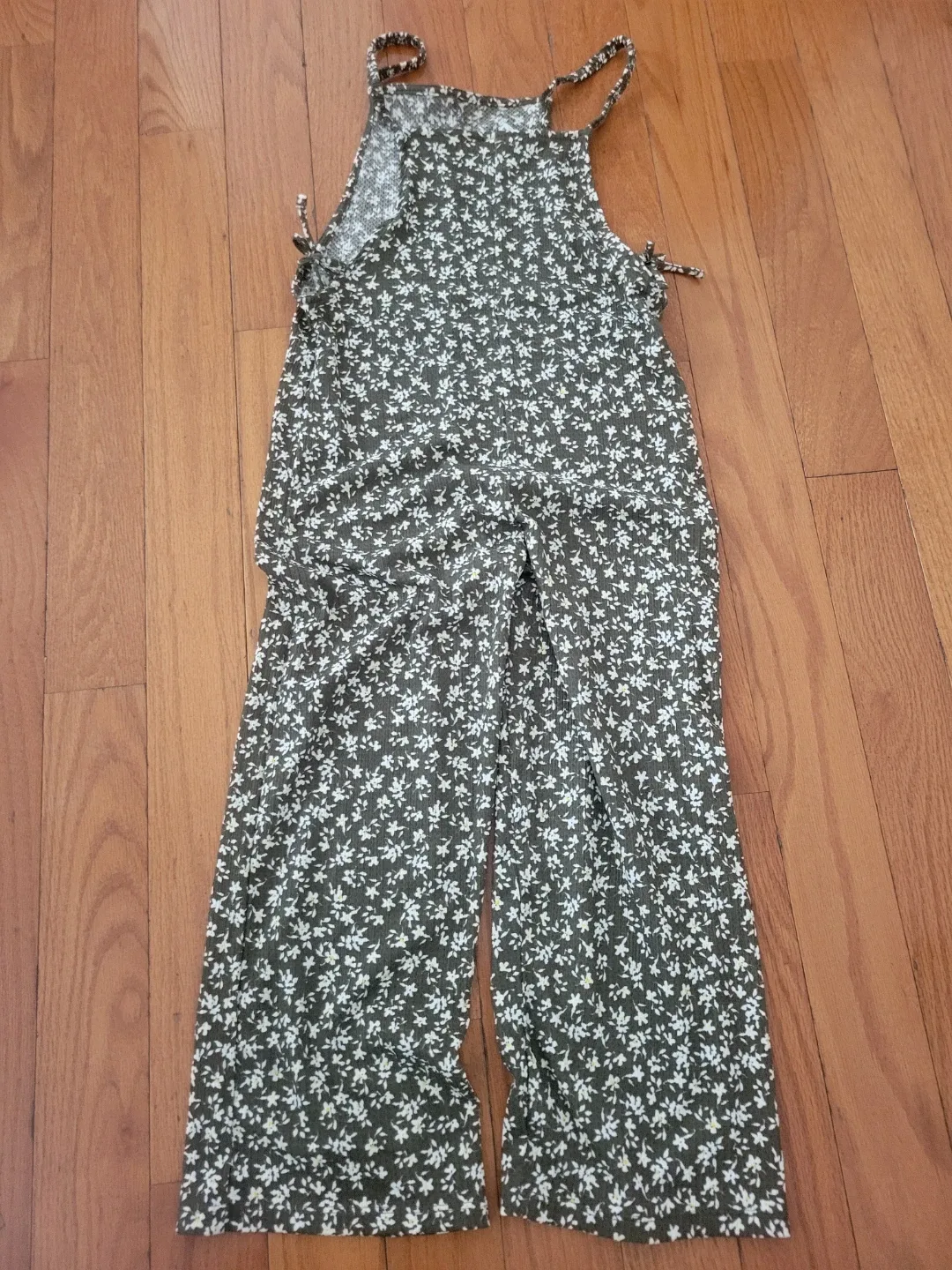 Floral jumpsuit and plaid trousers from Zara