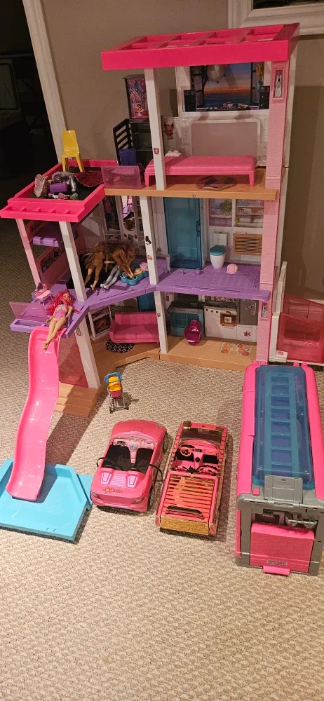 Barbie Dreamhouse, Camper, and Cars image indicator(2)