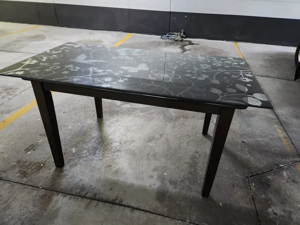 Black Dining Table with Floral Design