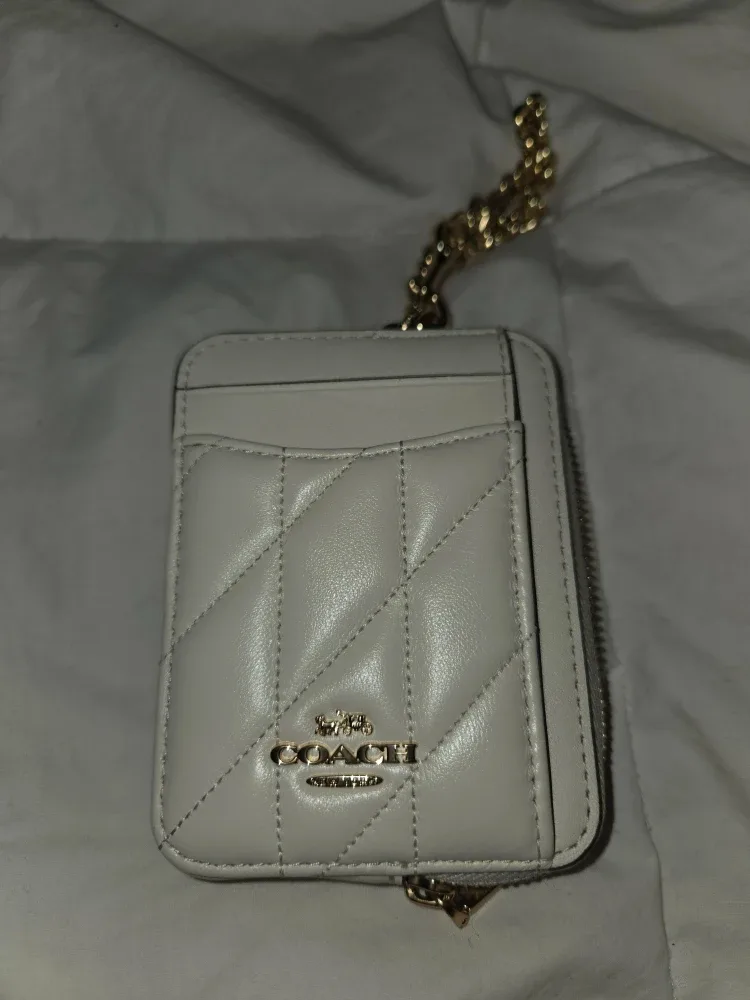 Coach off white quilted design image indicator(2)