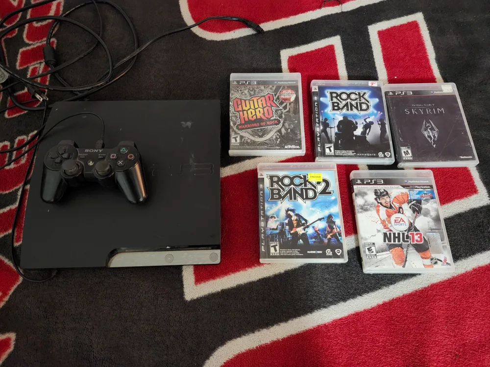 playstation 3 system with 4 games