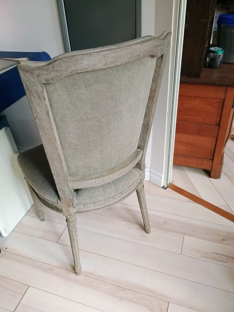 Grey upholstered accent chair image indicator(2)