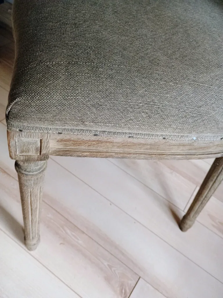 Grey upholstered accent chair image indicator(3)