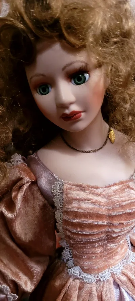 Porcelain Doll in Peach Dress image indicator(5)