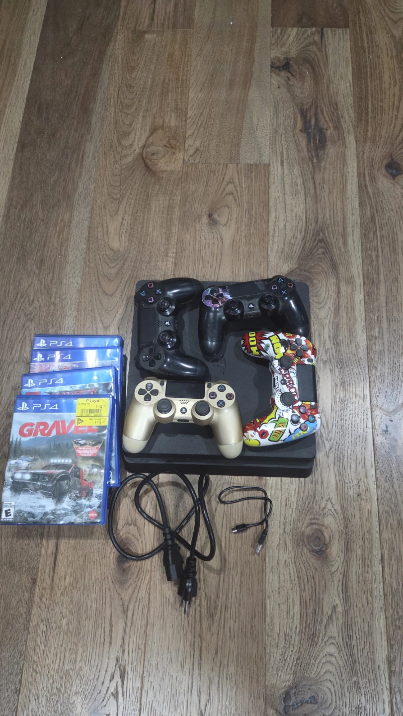 PlayStation 4 Slim with Games and Controllers