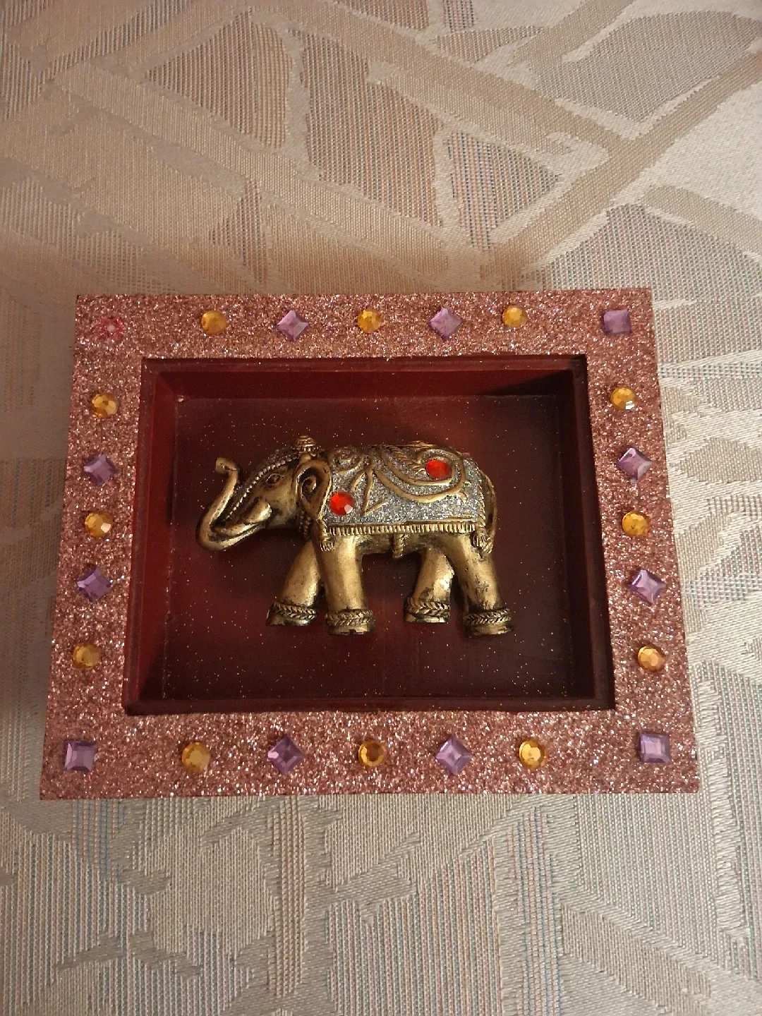 Decorative wall hanging frame featuring a 3D elephant figurine thumbnail