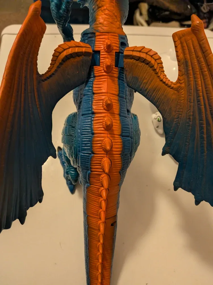 Blue and Orange Dragon Toys - need battery change image indicator(3)