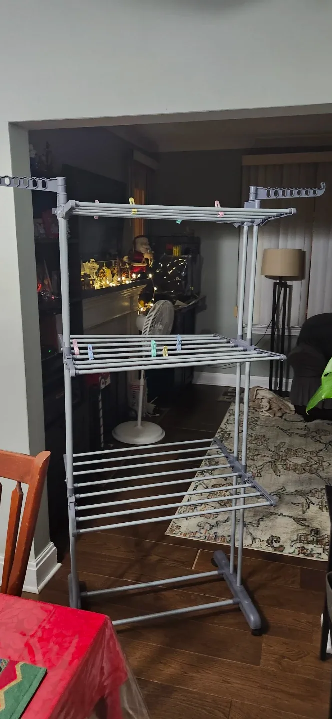 Grey Folding Clothes Drying Rack like new. Price no negotiable image indicator(4)