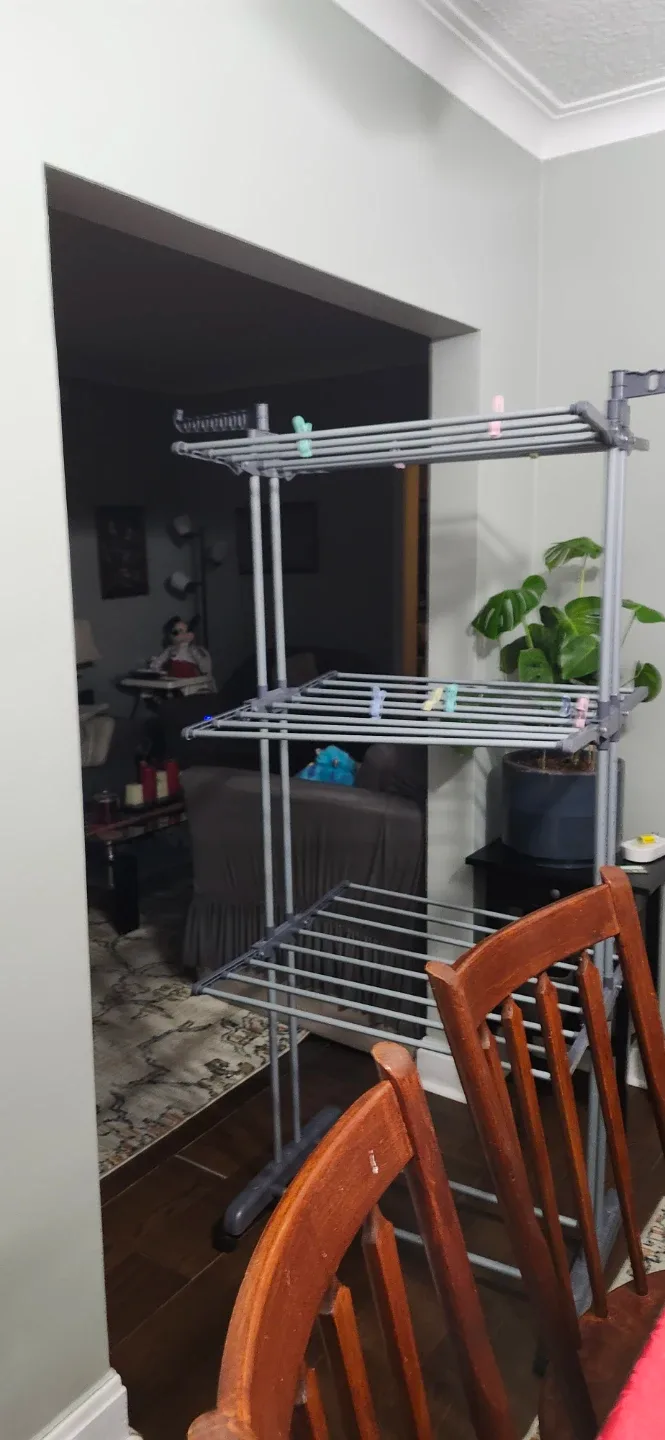 Grey Folding Clothes Drying Rack like new. Price no negotiable image indicator(5)
