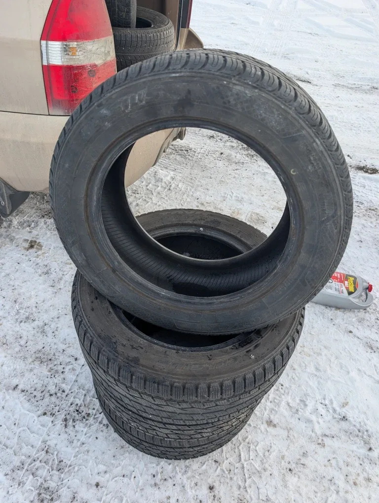 Set of 4  good Toyo Celsius winter tires 215/55R16