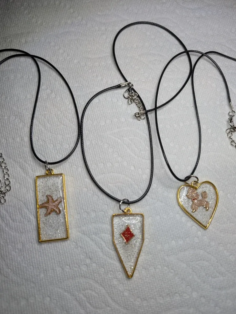 Handmade Resin Pendants on Black Cord Necklaces
