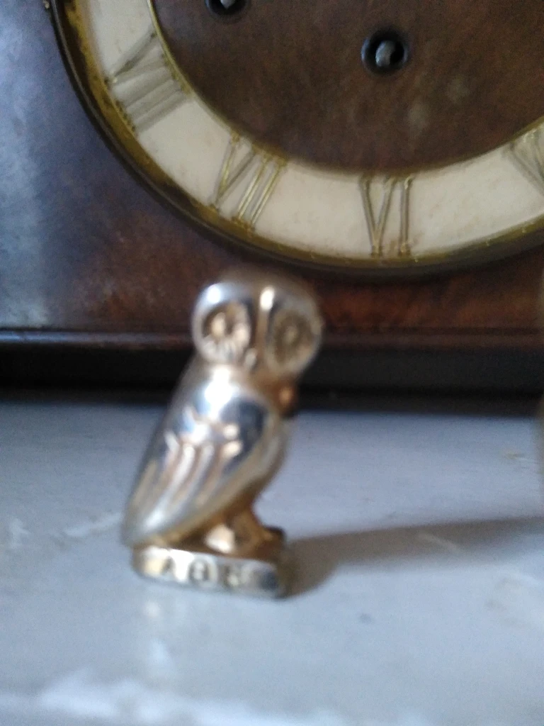 set of three collectible owls