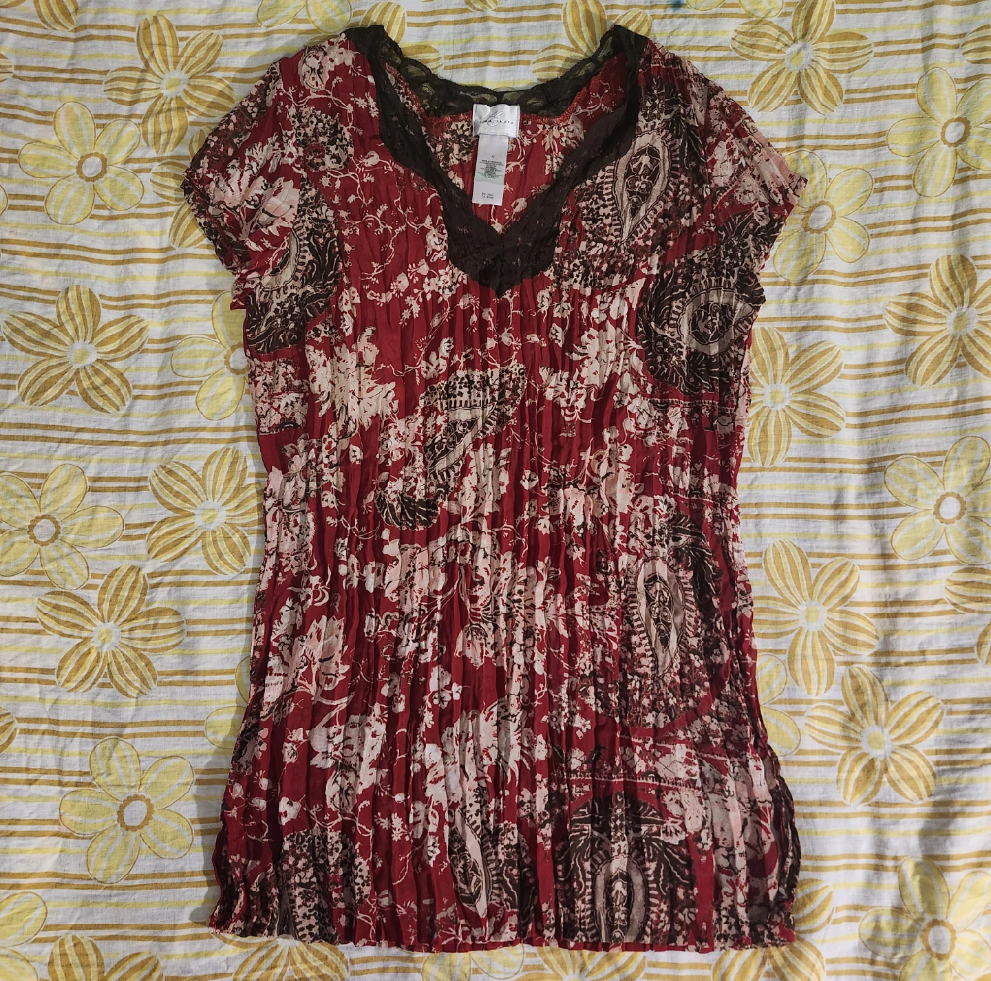Red and brown paisley print blouse with lace trim and pleats