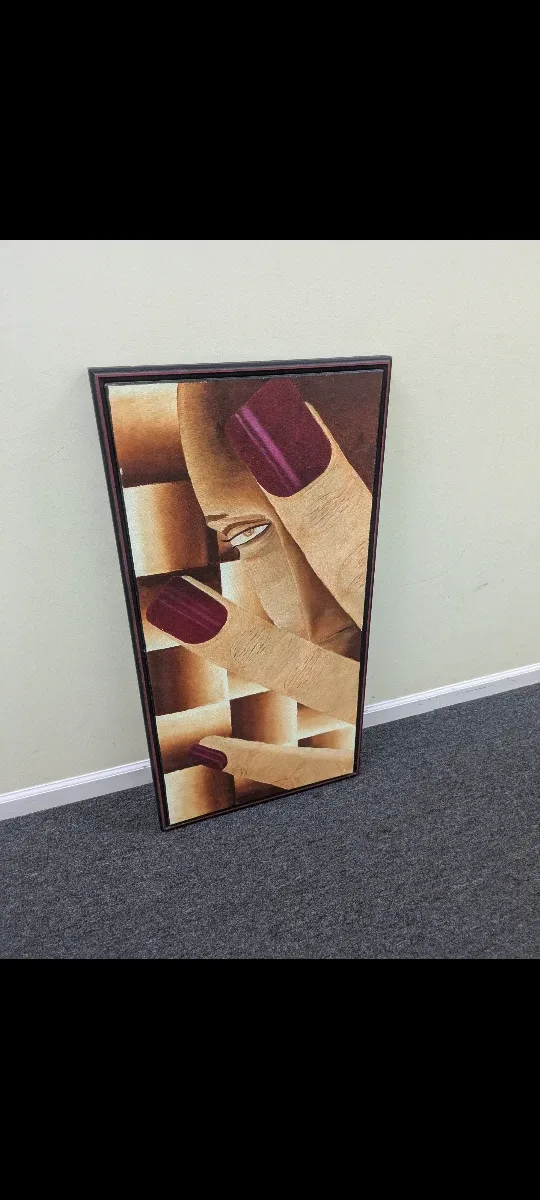 Framed lady showing nails painting image indicator(2)