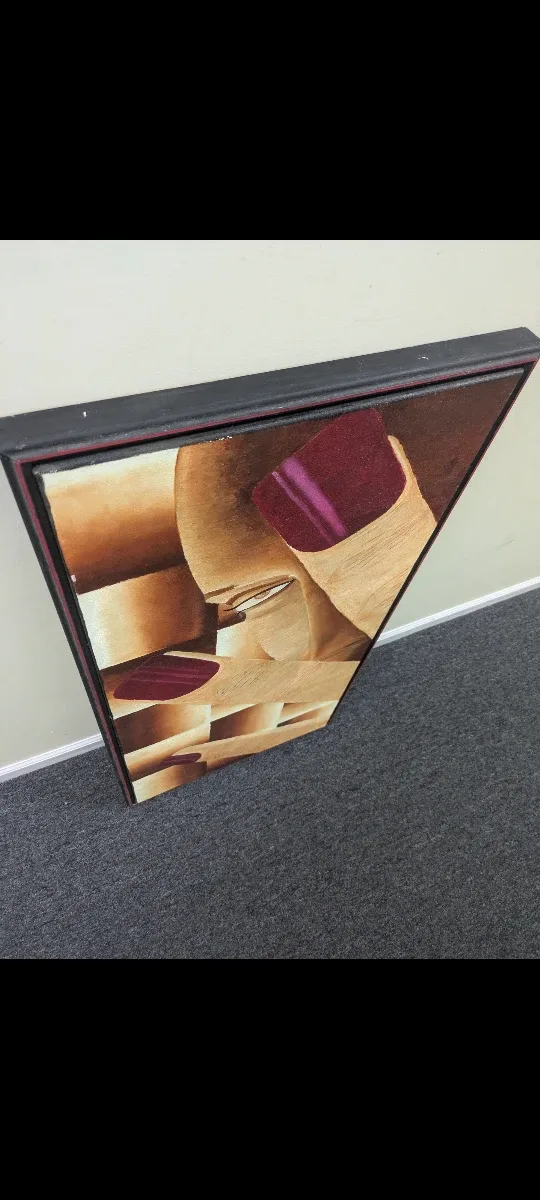 Framed lady showing nails painting image indicator(3)