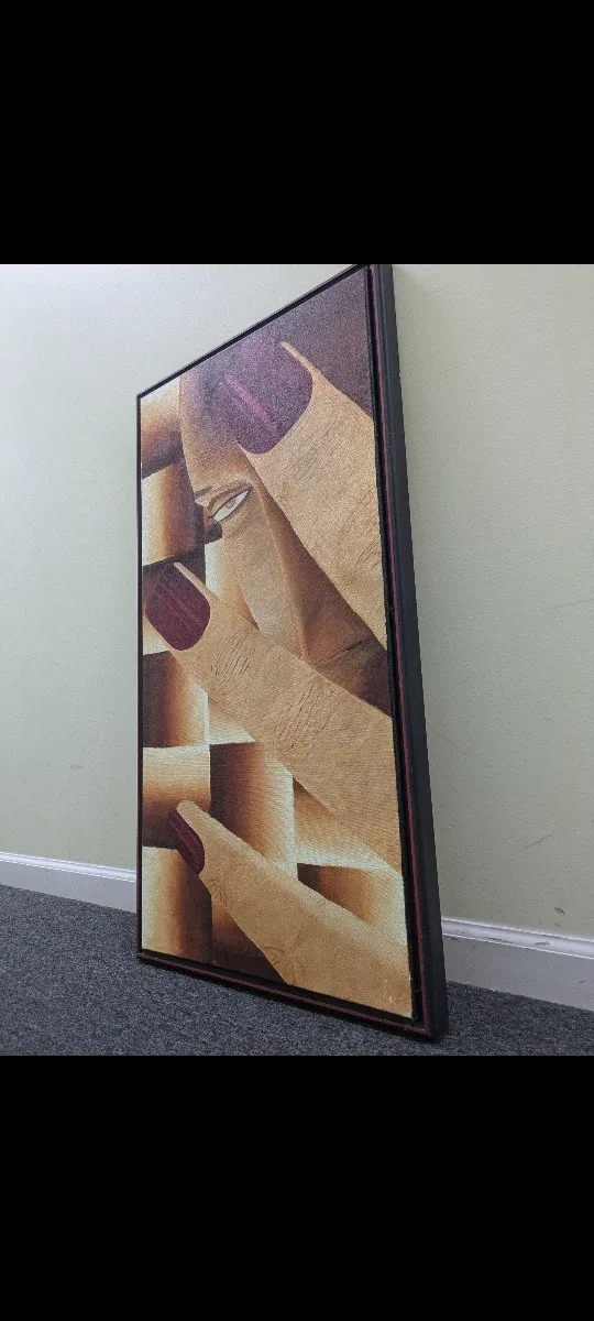 Framed lady showing nails painting image indicator(4)