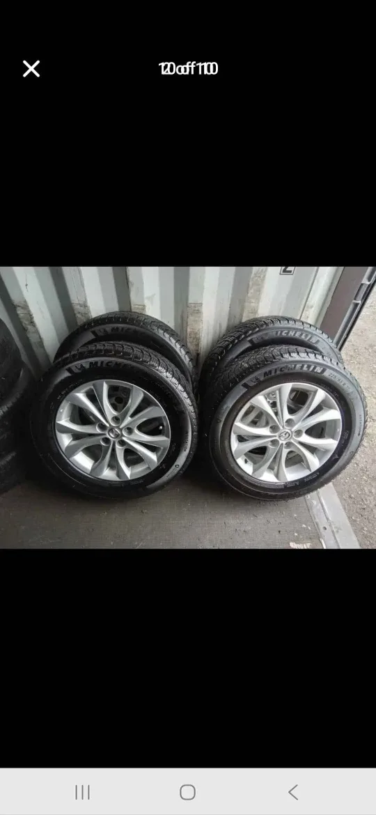 Michelin X-Ice Snow SUV Tires on Mazda Rims