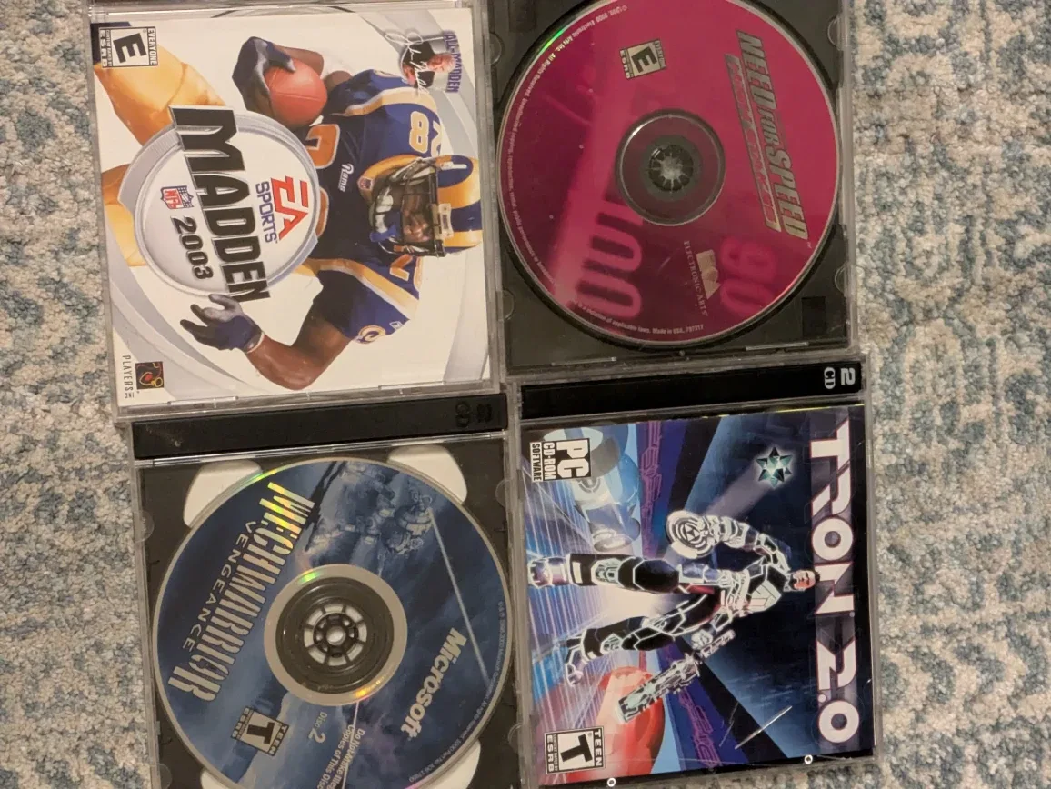 Mixed Lot of PC Games - Tiger Woods PGA Tour, Sims image indicator(9)