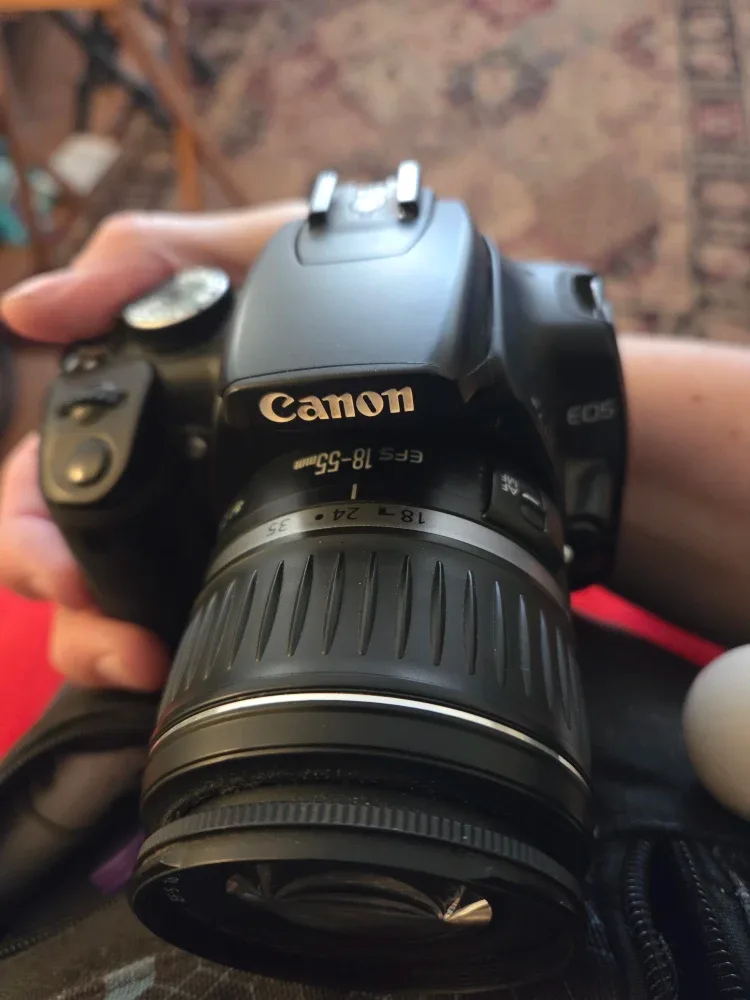 Canon EOS Rebel XTi DSLR Camera with 18-55 m lense image indicator(2)