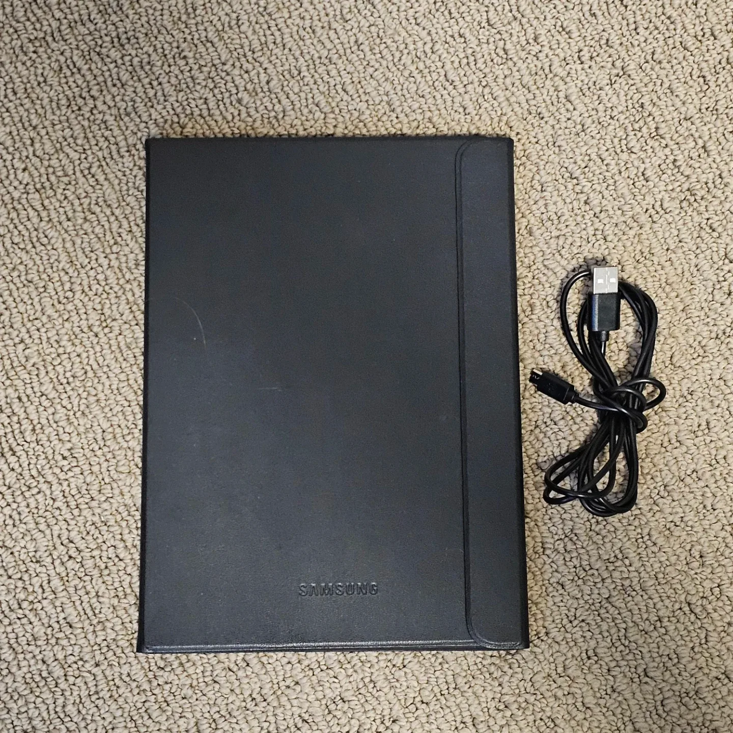 Samsung Galaxy Tab S2 with case and charging cord image indicator(4)